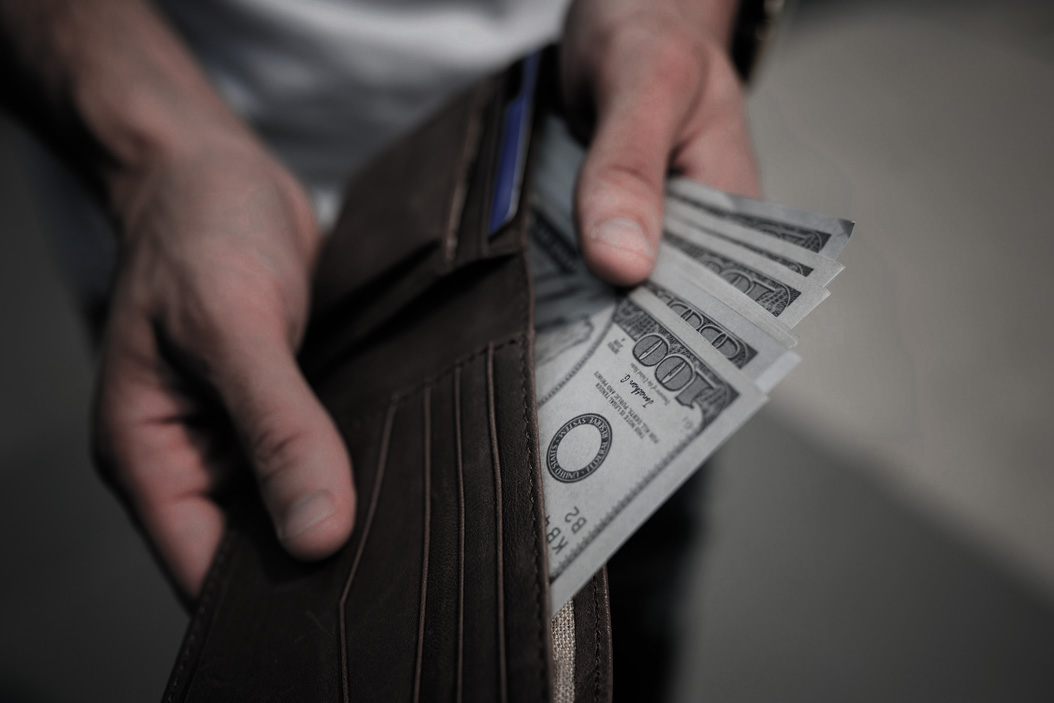 Removing cash from a wallet